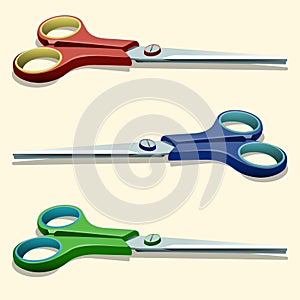 Illustration of red scissors, blue scissors and green scissors.