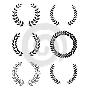 Illustration of a set of black round laurel wreaths