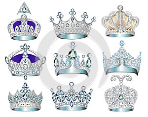 set of jewelry silver crowns with precious stones photo
