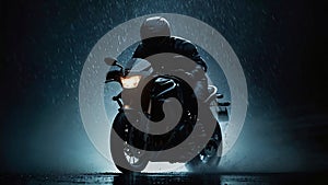 Illustration of the silhouette of a motorbike rider at night during heavy rain