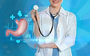 Illustration of stomach and doctor with stethoscope on light blue background, closeup