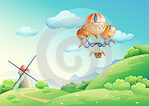 Illustration of summer fields with a balloon in the sky