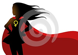 Superheroine in red cape with female symbol photo