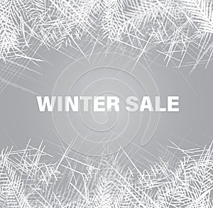 Illustration of the text winter sale with the frosted glass window with the traces of frost, snow, ice, snowflakes.