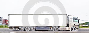 Illustration of a truck with a large white semi-trailer. Free white space for text, advertising and logo on trailer