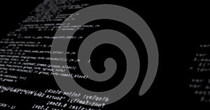 Illustration of white computer programming language against black background
