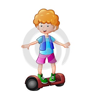 Young boy riding a electric scooter