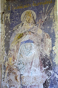 Illustrations from the bible on the wall of an abandoned temple