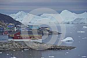 Ilulissat, Greenland, with icebergs floating in Disko Bay