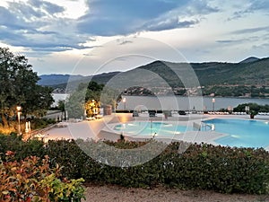 Iluminated swimming pool at night.