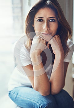 Im dedicating this day to me. Portrait of an attractive young woman relaxing at home.