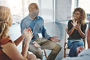 Im glad you like it. Shot of a group of diverse creative employees having a meeting inside.