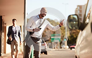 Im going to be late, I need a ride immediately. a handsome young businessman hailing a ride in the city.