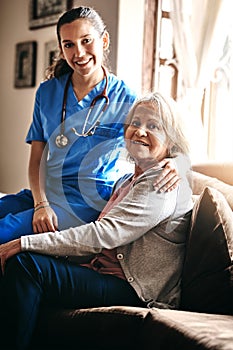 Im helping her best I can. a female nurse and a senior woman in a retirement home.