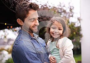 Im a princess because my father is a king. Shot of a little girl and her father spending time together outdoors.