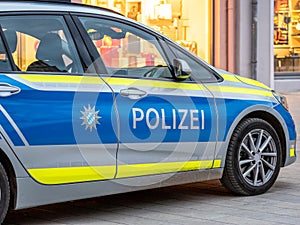 Imaga of a german police car from the state of bavaria with the letters polizei on the door photo