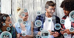 Image of 6g texts over diverse friends using smartphones