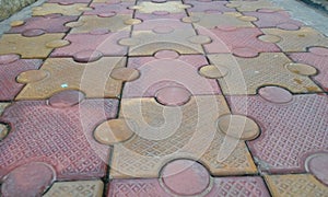 Image of 80 mm thick interlocking tile flooring laid outside of an residential building