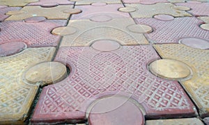 Image of 80 mm thick interlocking tile flooring laid outside of an residential building