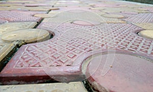 Image of 80 mm thick interlocking tile flooring laid outside of an residential building