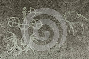 An image of an ancient man`s hunting on the wall