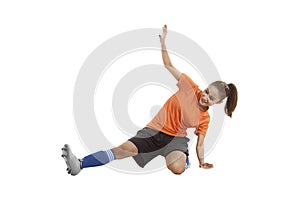 Image of asian football player sliding tackle