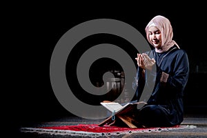 The image of an Asian Muslim woman in the Islamic religion in hijab in cream and black color