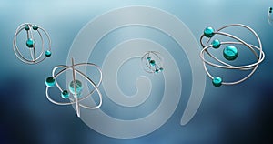 Image of atom models spinning on blue background
