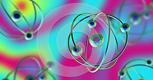 Image of atom models spinning over multicoloured vibrant background