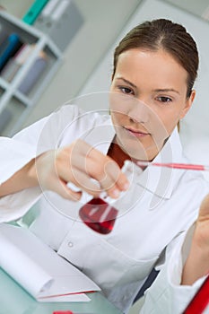 Image attractive woman experimenting in laboratory