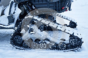 The image of the ATV with a tracked system.