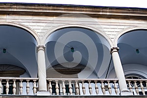 Image balconies, terraces with arches and columns in the Italian yard in Lviv, Ukraine