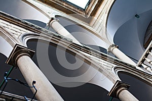 Image balconies, terraces with arches and columns in the Italian yard in Lviv, Ukraine