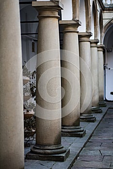 Image balconies, terraces with arches and columns in the Italian yard in Lviv, Ukraine