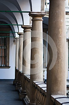 Image balconies, terraces with arches and columns in the Italian yard in Lviv, Ukraine