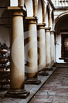 Image balconies, terraces with arches and columns in the Italian yard in Lviv, Ukraine