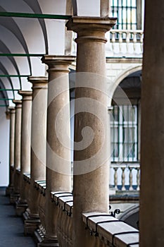 Image balconies, terraces with arches and columns in the Italian yard in Lviv, Ukraine