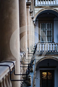 Image balconies, terraces with arches and columns in the Italian yard in Lviv, Ukraine
