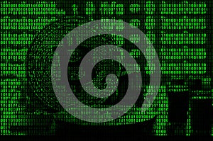 Image of the binary code from bright green digits, through which the image of the physical bitcoin