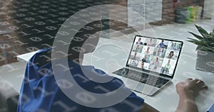 Image of binary coding over diverse business people having image call photo