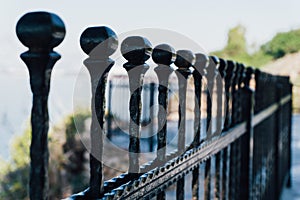 Image of a black metal fence.