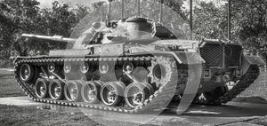 Image of a black and white retired military tank