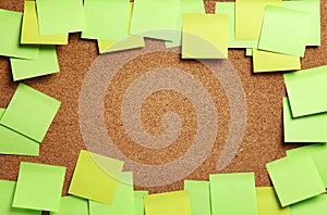 Image of blank green and yellow sticky notes