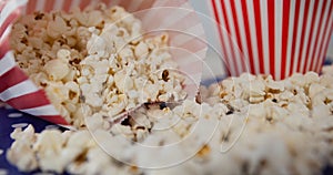 Image of box of popcorn over red and white box