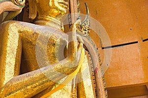 Image of buddha hand hold on breast