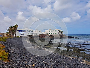 Image of buildings on the coast and the sea in Arrieta. Lanzarote, Spain photo