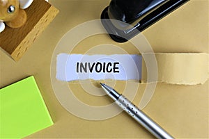 An Image of a Business concept with text invoice - torn paper - copy space