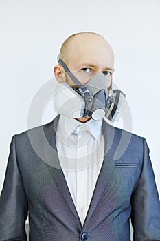 Image of business man wearing protective mask against virus and pollution