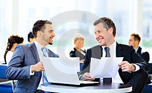 Image of business partners discussing