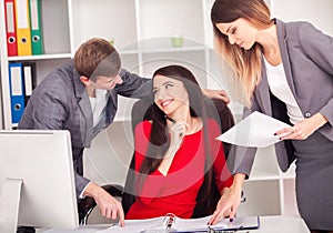 Image of business partners discussing documents and ideas at meeting